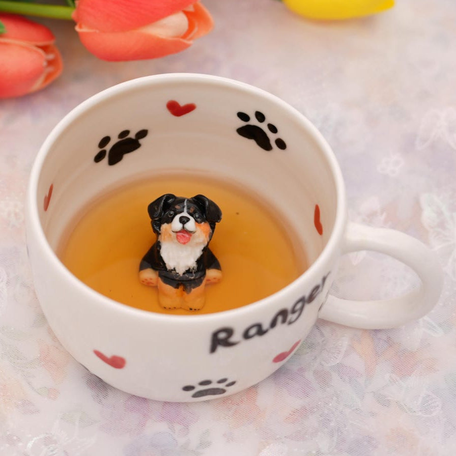 Cup with a dog figurine and tulips on a light background