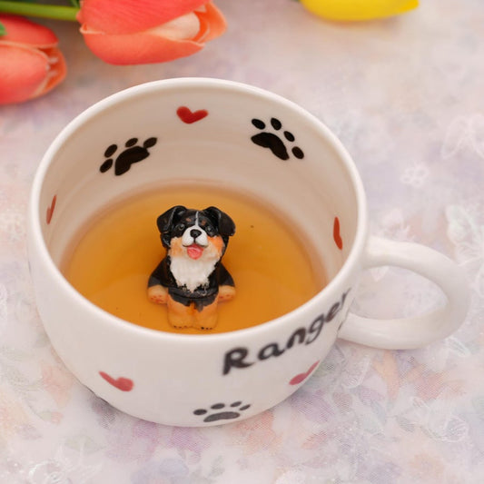 Cup with a dog figurine and tulips on a light background